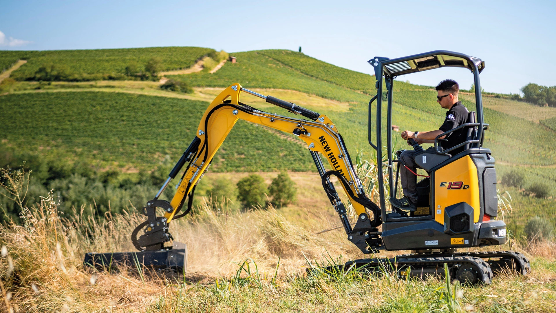 D-Series Mini Excavator working on the field