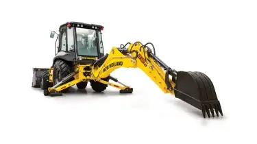 Loader backhoe with extended arm.