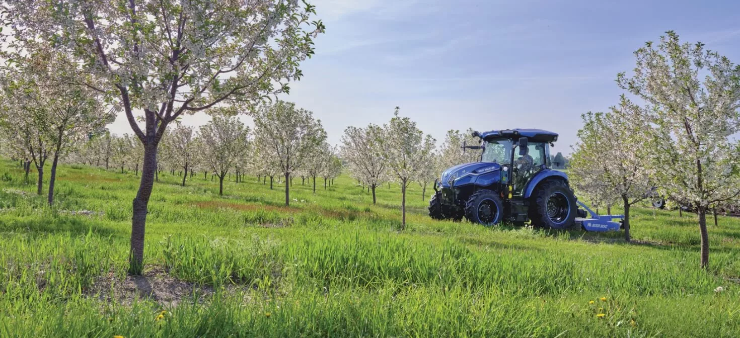 T4 Electric Tractor in a grassy field