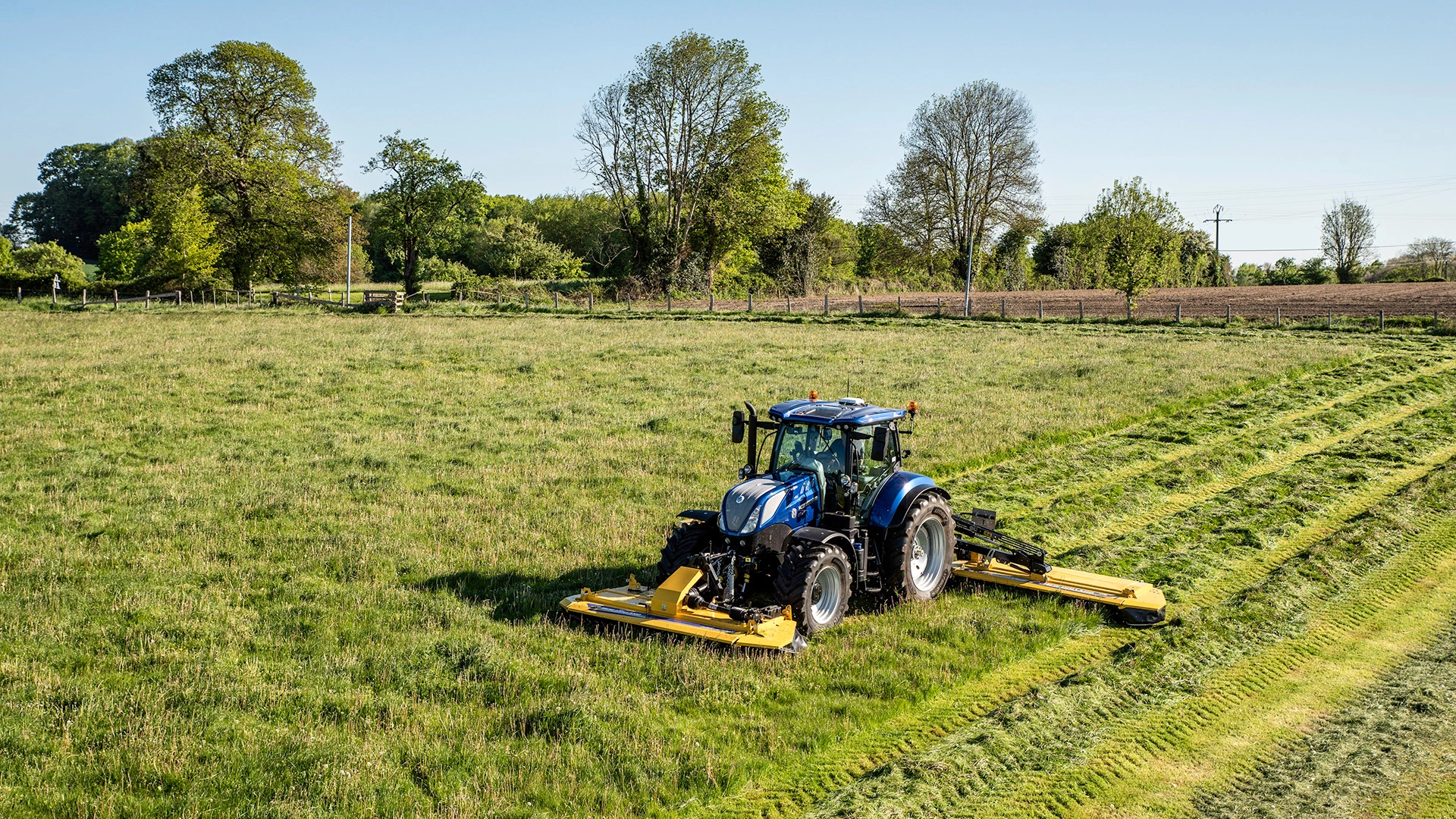 Tractor with Megacutter™ Triple Mower