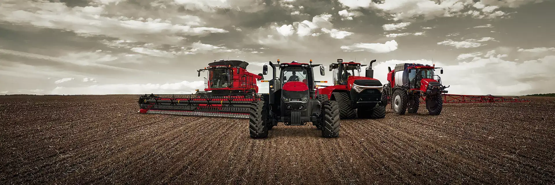 Axial-Flow combine, Magnum tractor, Steiger tractor, Patriot sprayer in field 