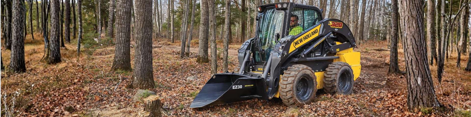 Skid steer loader with tree spade.
