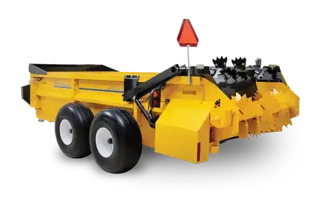 Diagonal profile of a yellow box spreader.