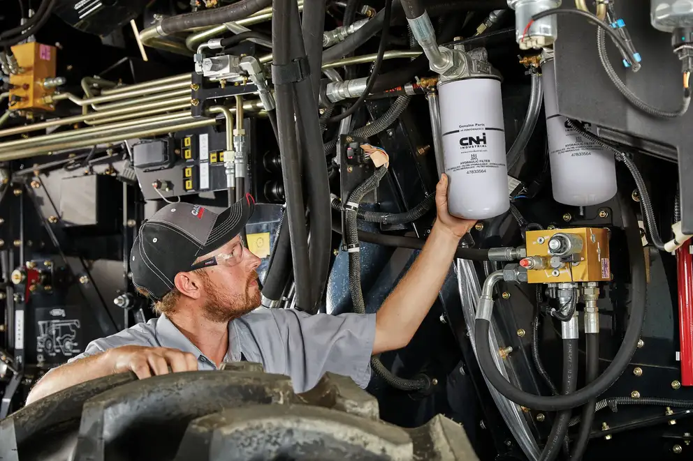 Case IH technician changing filter