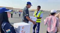New Holland Middle East and Africa team distributes 500 meal packs to people in labor camps