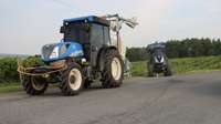 New Holland T4 Tractors on a road.