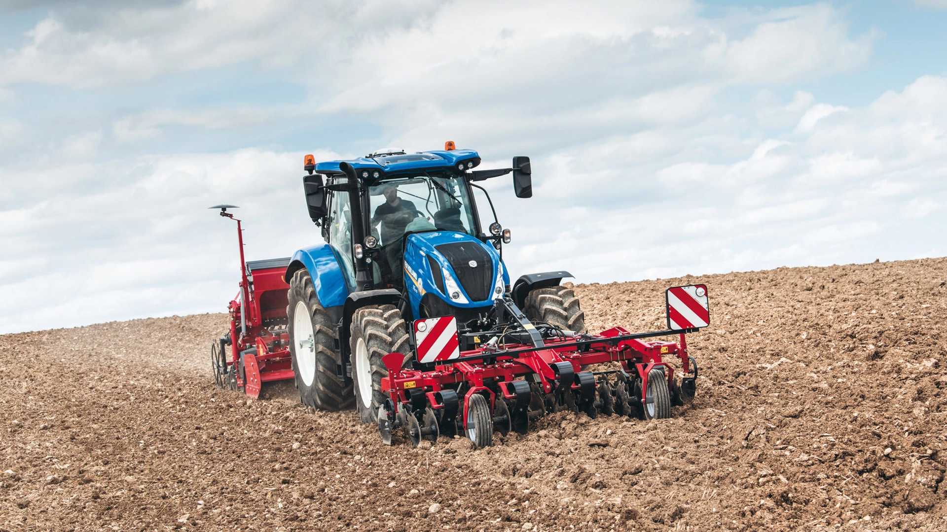 T5 Dynamic Command & Auto Command tractor actively engaged in agricultural field work