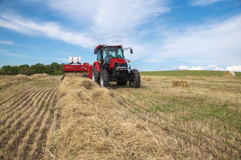 Farmall 95A with SB541 processing hay