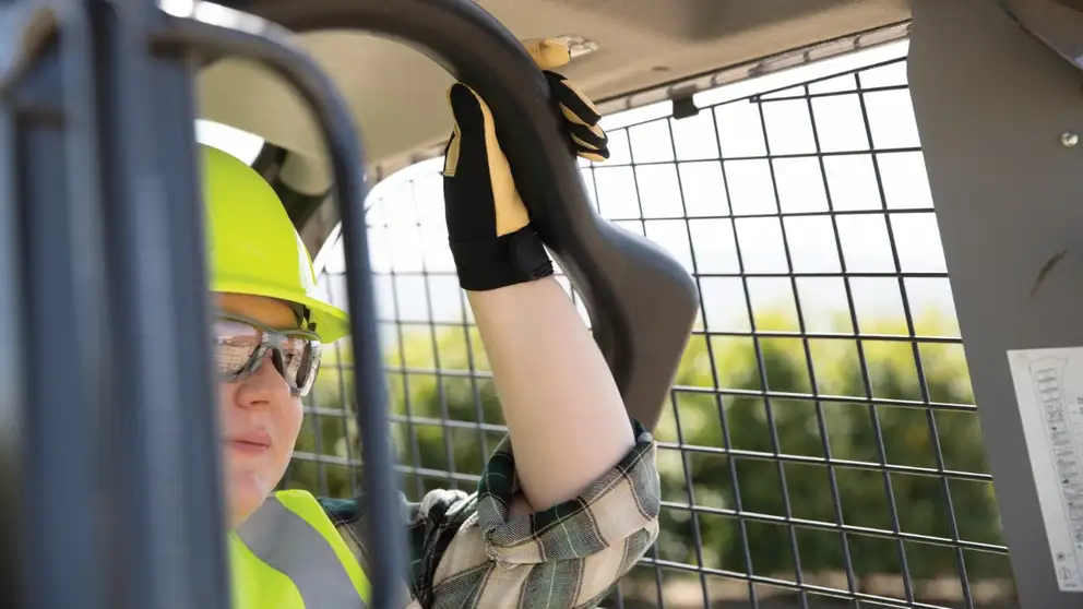 Operator inside of an F50C forklift