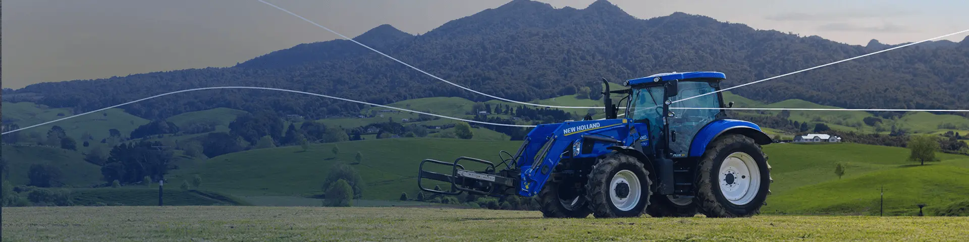 New Holland tractor sitting in New Zealand field for Government Incentive program 