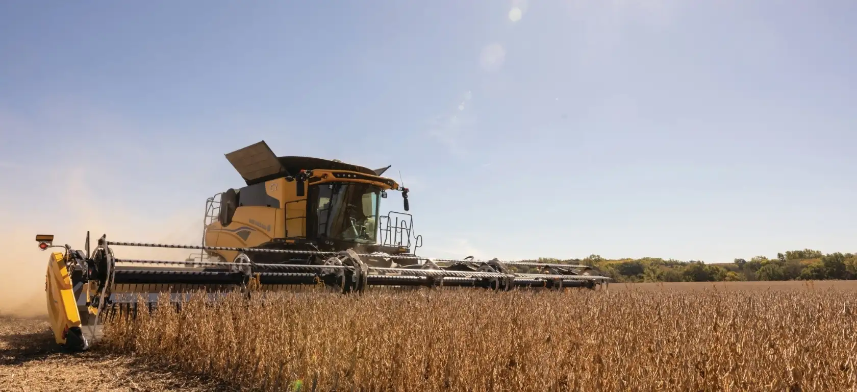 New Holland Twin Rotor® combine with MacDon FlexDraper® Header