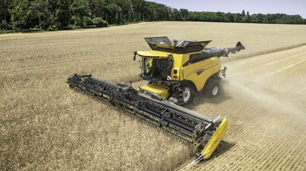 New Holland CR Combine working in field