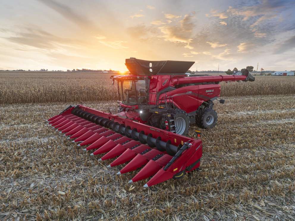 CASE IH AF10 combine at sunset with c516 corn head