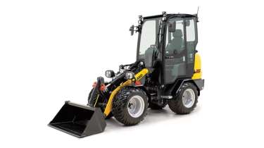 Small articulated loader from the side.