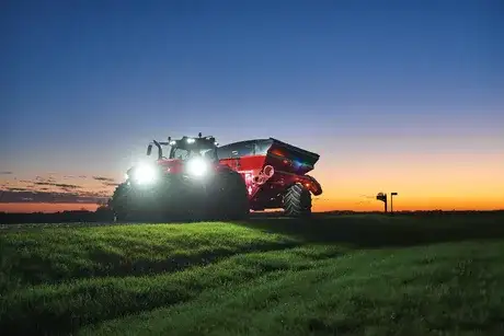 Case IH Magnum 380 tractor in field, dark far shot