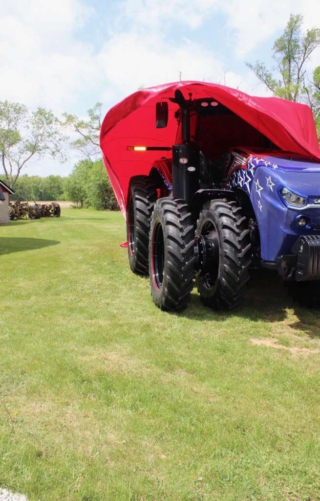 The Providence Magnum was unveiled after a custom made, Case IH red, parachute was pulled back. 
