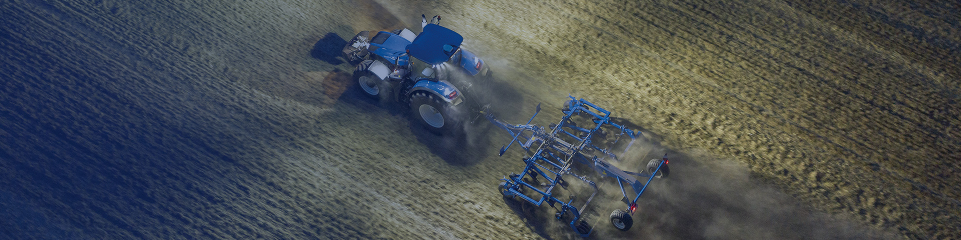 New Holland precision tractor working in field