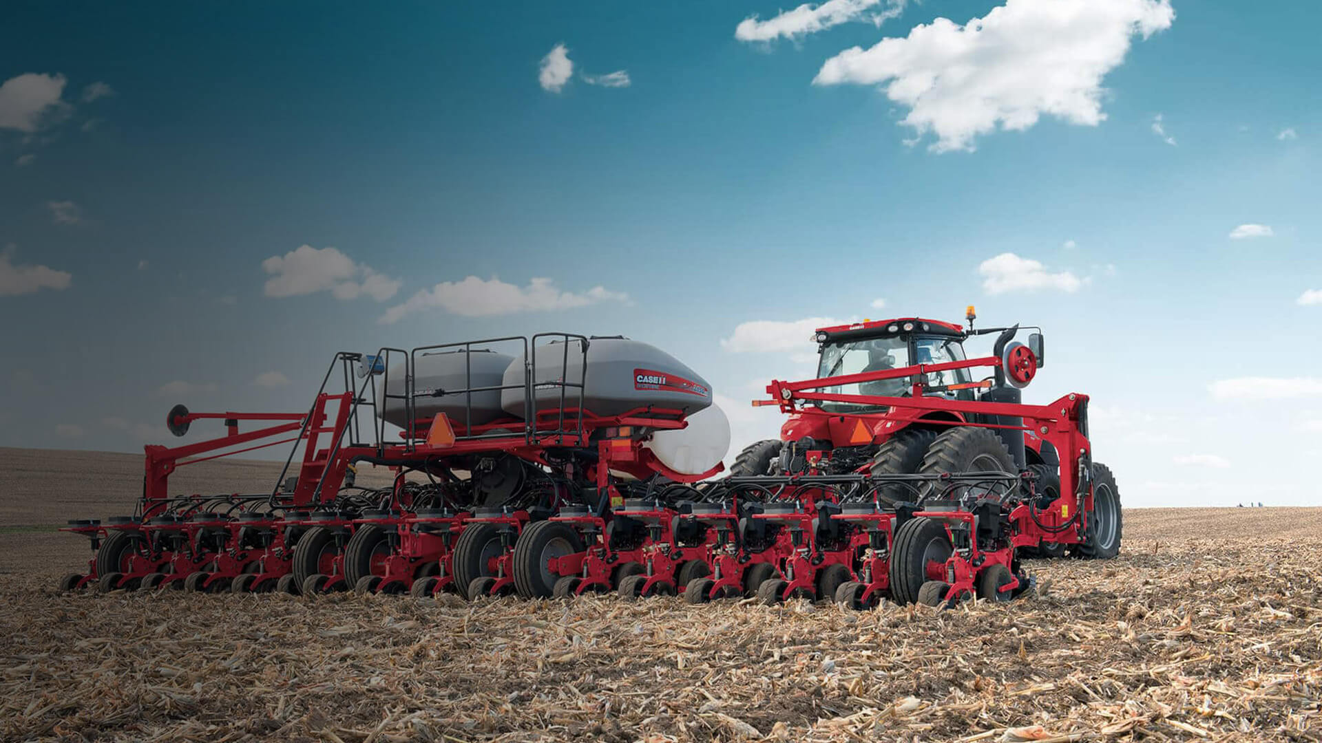 Red Case IH Early Riser 2150 model working in paddock